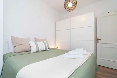 Cama o camas de una habitación en Good Memories en el Sol de Madrid