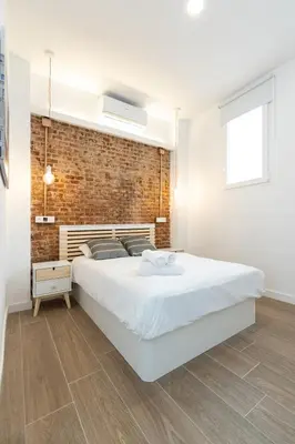 Cama o camas de una habitación en Ricardo Ortiz 26 by JD