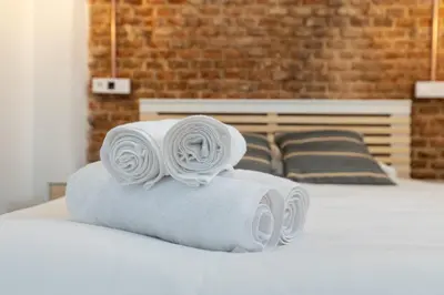 Cama o camas de una habitación en Ricardo Ortiz 26 by JD
