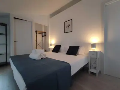 Cama o camas de una habitación en Piso luminoso Alcalá con vistas al Retiro