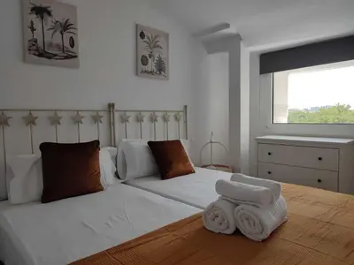 Cama o camas de una habitación en Piso luminoso Alcalá con vistas al Retiro