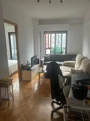 Zona de estar de Madrid Retiro Room