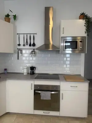 Una cocina o zona de cocina en Moderno espectacular hogar en Puerta del Ángel