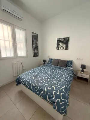 Cama o camas de una habitación en Moderno espectacular hogar en Puerta del Ángel