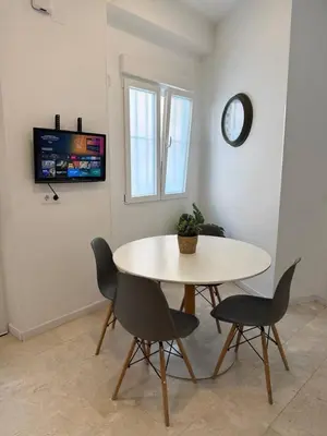 Una televisión o centro de entretenimiento en Moderno espectacular hogar en Puerta del Ángel