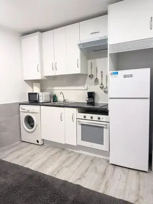 Una cocina o zona de cocina en Aparta-Estudio a unos pasos del Paseo el Prado
