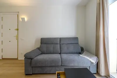 Zona de estar de Comodo piso a 10 min de Puente Toledo, 4 pax, ac y luz natural