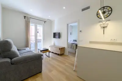 Zona de estar de Comodo piso a 10 min de Puente Toledo, 4 pax, ac y luz natural