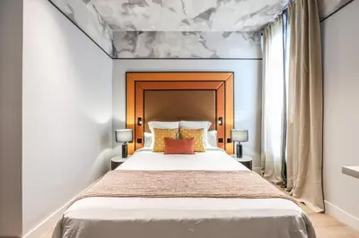 Cama o camas de una habitación en ColivINN Plaza Mayor
