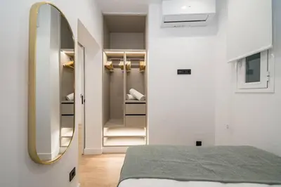 Cama o camas de una habitación en Esencia de La Latina San Pedro