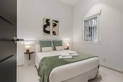 Cama o camas de una habitación en Waou Urban Home Salamanca II