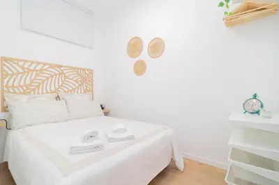 Cama o camas de una habitación en Esplendor Efímero de Madrid