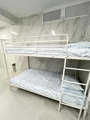 Cama o camas de una habitación en Hostel JIRAFA