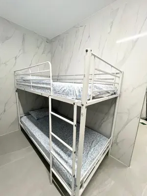 Cama o camas de una habitación en Hostel JIRAFA
