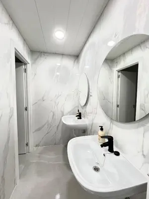 Un baño de Hostel JIRAFA