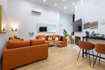 Una televisión o centro de entretenimiento en Central and luxury Apartment in Madrid