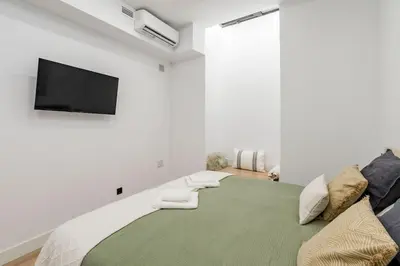 Cama o camas de una habitación en Confort Urbano junto Anton Martín