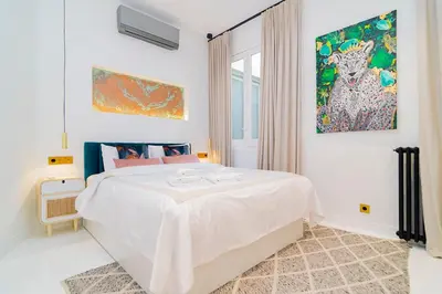 Cama o camas de una habitación en Luxury Golden Apartamento a solo pasos de Gran Vía