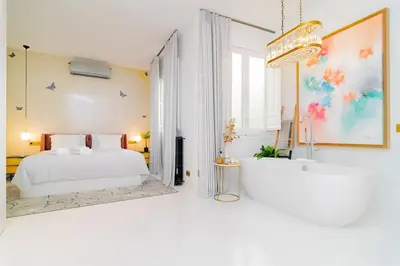 Cama o camas de una habitación en Luxury Golden Apartamento a solo pasos de Gran Vía