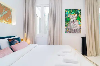 Cama o camas de una habitación en Luxury Golden Apartamento a solo pasos de Gran Vía