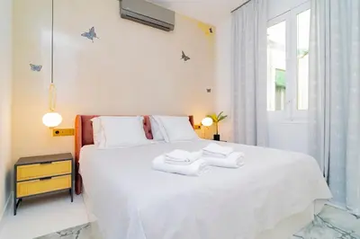 Cama o camas de una habitación en Luxury Golden Apartamento a solo pasos de Gran Vía