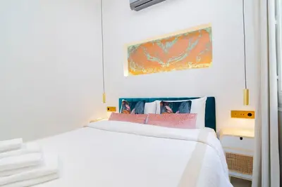 Cama o camas de una habitación en Luxury Golden Apartamento a solo pasos de Gran Vía