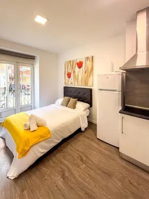 Cama o camas de una habitación en Comodo Aparta Estudio en Ronda de Valencia A4