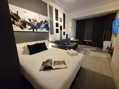 Cama o camas de una habitación en Habitación Oasis F. centro de Madrid!