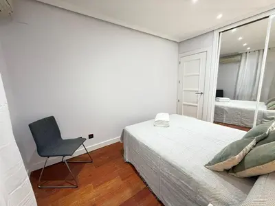 Cama o camas de una habitación en Habitaciones en Toledo