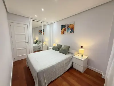 Cama o camas de una habitación en Habitaciones en Toledo