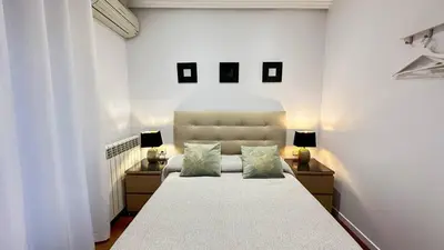 Cama o camas de una habitación en Habitaciones en Toledo