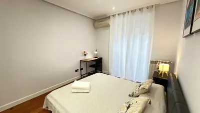 Cama o camas de una habitación en Habitaciones en Toledo