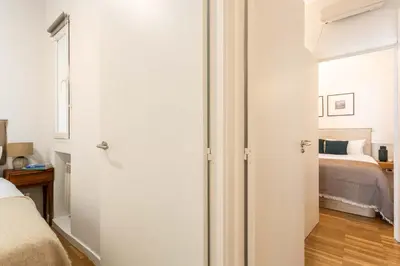 Cama o camas de una habitación en Charming 2BD Apartment with Terrace