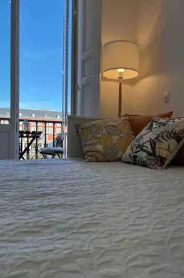 Cama o camas de una habitación en Elegante estudio en Plaza Mayor