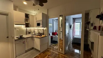 Una cocina o zona de cocina en Apartament Azca 34