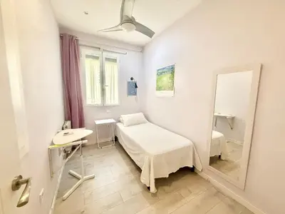 Cama o camas de una habitación en Metro Legazpi 03 AMCH Hospedaje