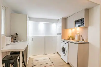 Una cocina o zona de cocina en Gran Via- Chueca (Tarifas Mensuales Disponibles)