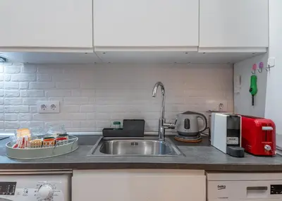 Una cocina o zona de cocina en 3min Walk Malasana - Trendy Cafes and Tapas Street