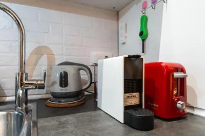 Una cocina o zona de cocina en 3min Walk Malasana - Trendy Cafes and Tapas Street