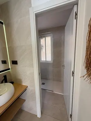 Un baño de Retiro Residence esmeralda