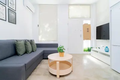 Una televisión o centro de entretenimiento en Moderno refugio en Madrid