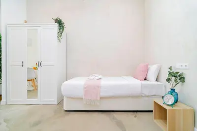 Cama o camas de una habitación en Moderno refugio en Madrid