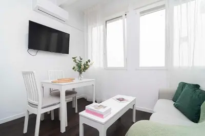 Una televisión o centro de entretenimiento en Loft Chill en el Corazón de Madrid