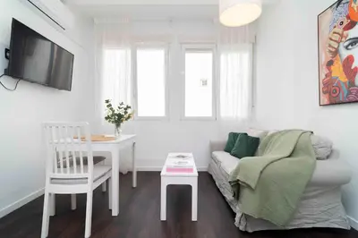 Una televisión o centro de entretenimiento en Loft Chill en el Corazón de Madrid