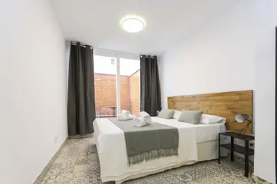 Cama o camas de una habitación en Regency IV - Ferga Suites