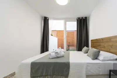 Cama o camas de una habitación en Regency IV - Ferga Suites