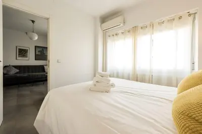 Cama o camas de una habitación en Alojamiento temporal en Fuencarral, Chueca
