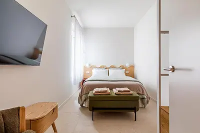 Cama o camas de una habitación en Apartamento para 9 personas en Malasaña