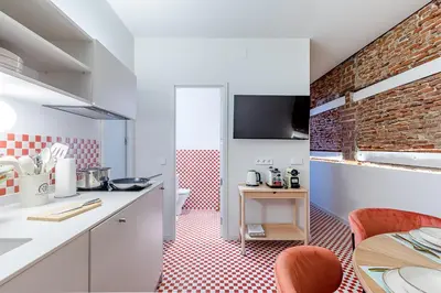 Una cocina o zona de cocina en Apartamento para 9 personas en Malasaña