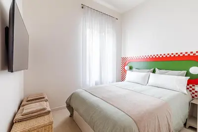Cama o camas de una habitación en Apartamento para 9 personas en Malasaña